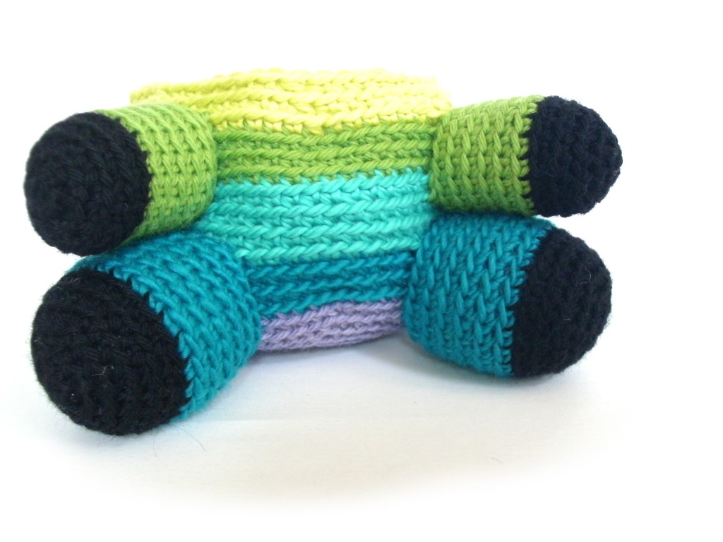 crocheted body with four limbs attached with whipstitch