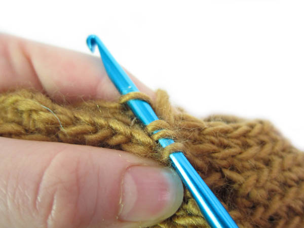 crocheting on an arm