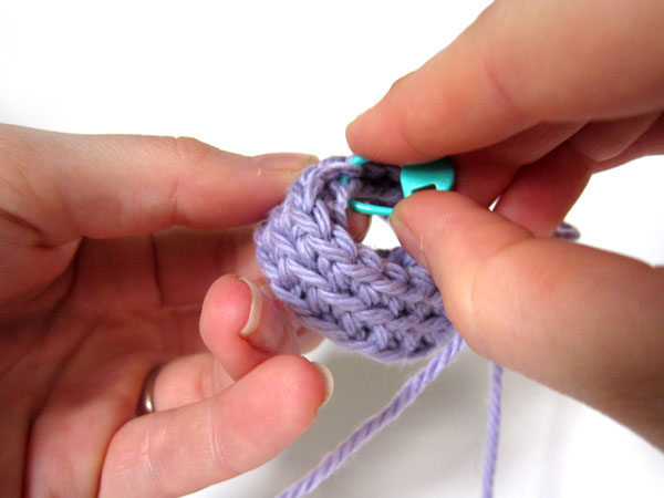 using a locking stitch marker to secure fabric